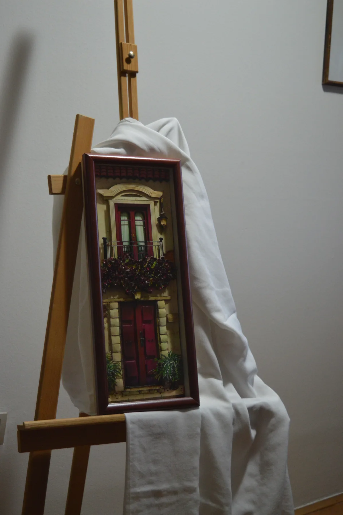 Tall architectural paper relief tableau