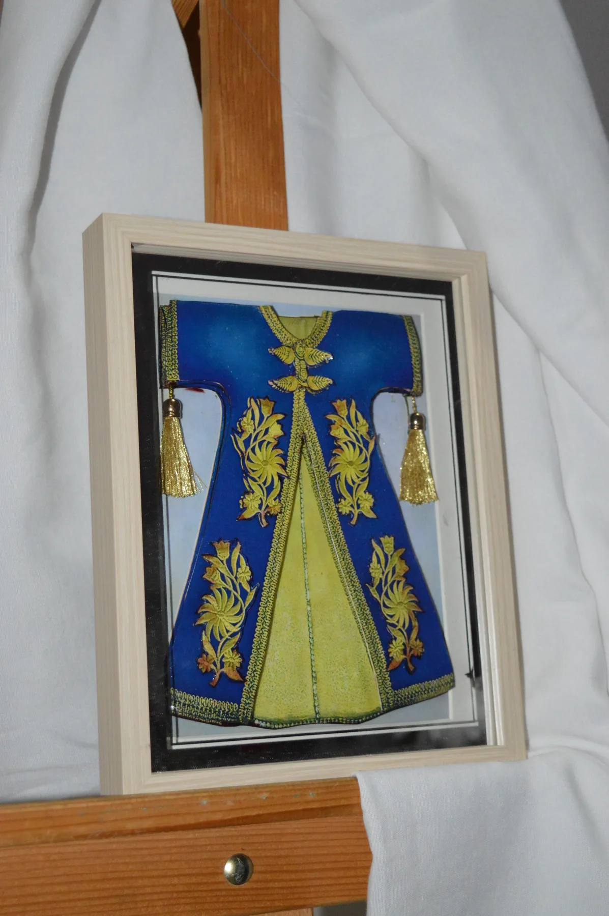 Blue and gold paper relief tableau